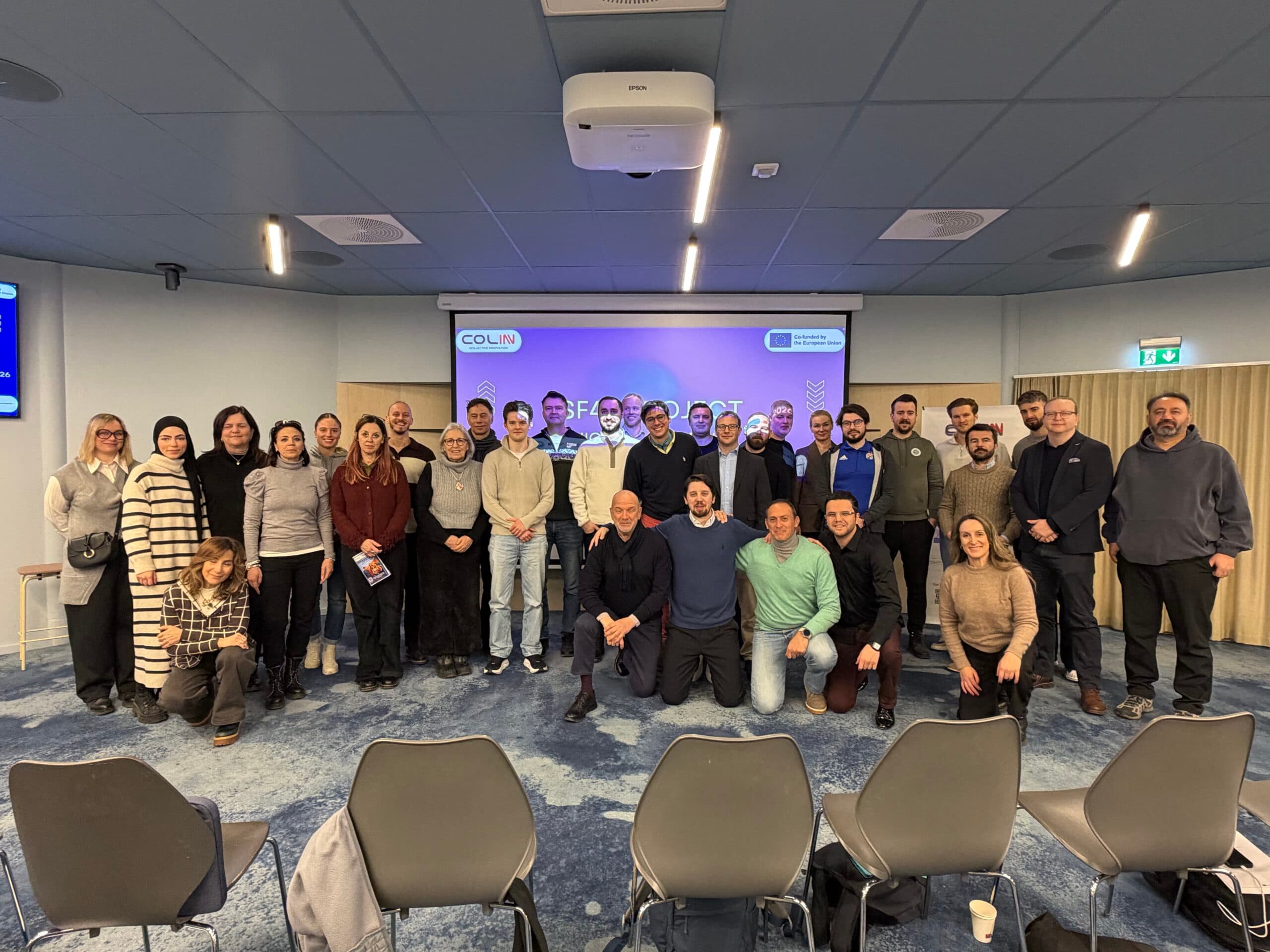 SF4Sport participants gathered for a group photograph in a meeting room in Oslo